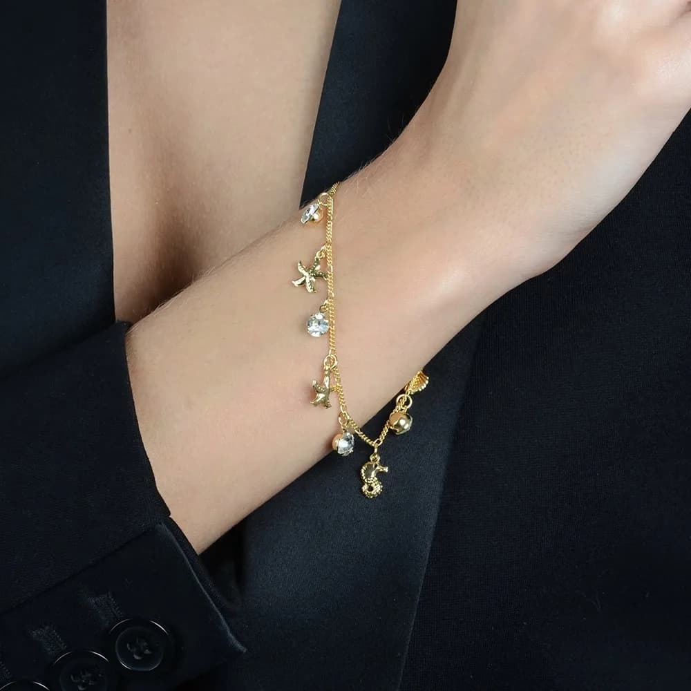Pulseira Dourada Fundo do Mar e Ponto de Luz · Banhado a Ouro 18k